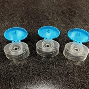 Shampoo flip top cap two color mold 