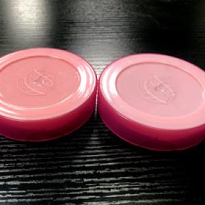 Two color cosmetic cap mold with unscrewing system