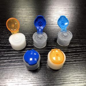 Two color flip top cap injection mold 