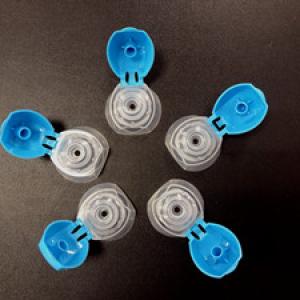 Two color flip top cap mold 